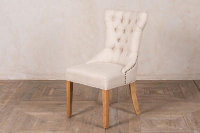 almond button back dining chair